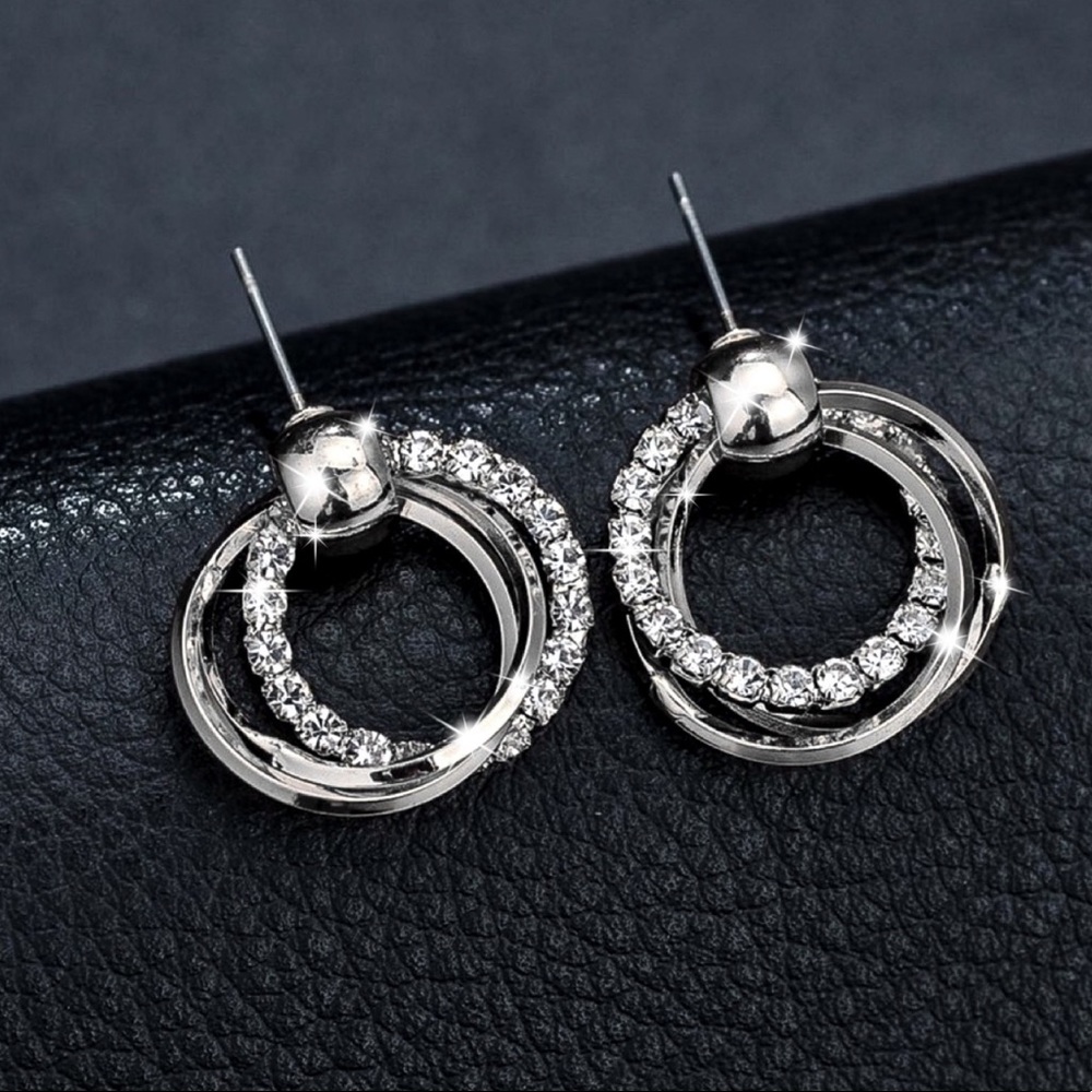 Any 2/$20! Silver Triple CZ Ring Stud Earrings - Picture 2 of 9